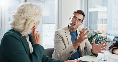 Buy stock photo Discussion, group and man with ideas, meeting and planning for marketing strategy, serious and boardroom. Communication, media buyer and people in office for campaign, teamwork or project in business