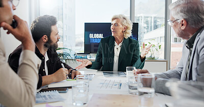 Buy stock photo Planning, talking and group meeting in boardroom, collaboration and communication for global trade. Teamwork, mature people and negotiation for international investment, economic trends and business