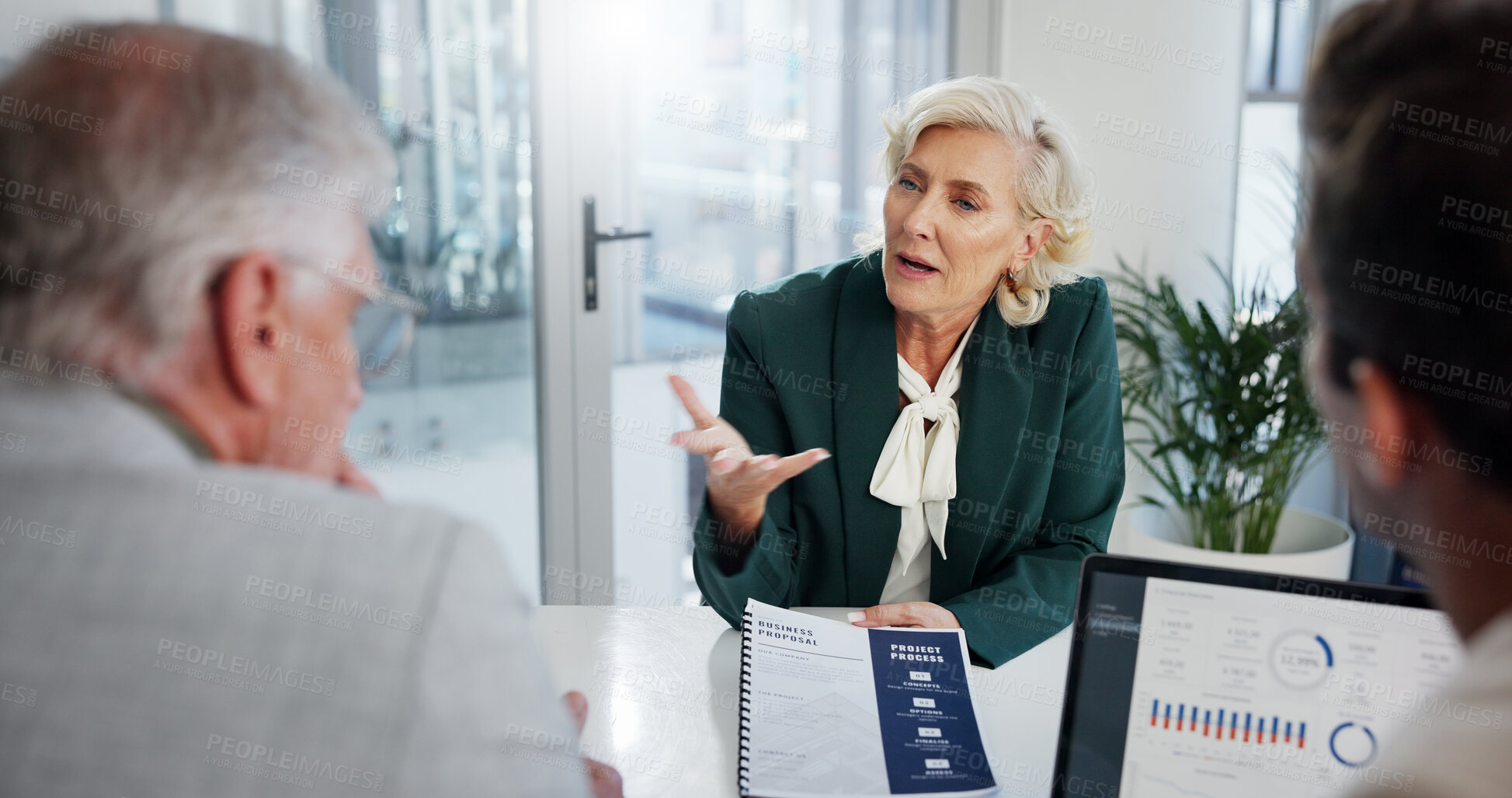 Buy stock photo Collaboration, colleagues and group with laptop, talking and review of economic trends on website. Teamwork, reading and discussion for investment in company, financial analyst and business proposal
