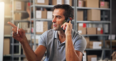 Buy stock photo Computer, logistics and phone call with man in warehouse for communication or problem solving. Boxes, pointing and supply chain with employee in distribution depot for delivery, ecommerce or shipping