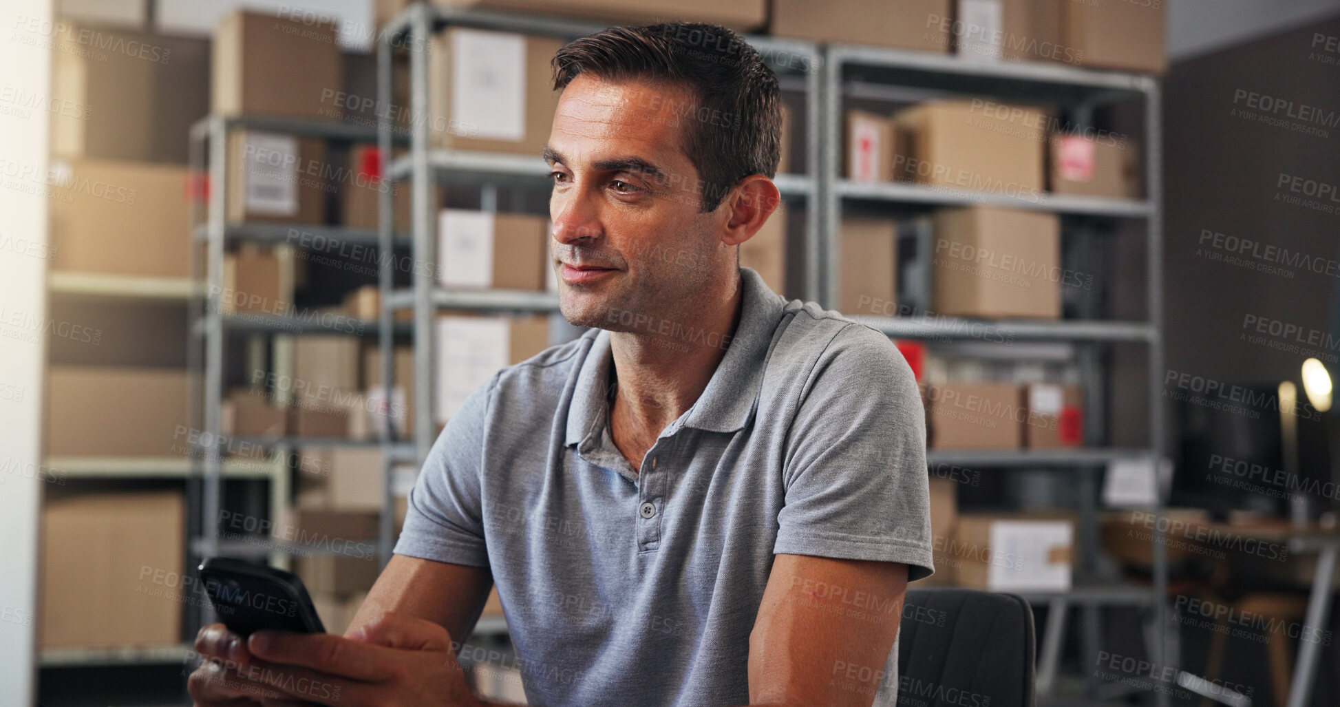 Buy stock photo Logistics, phone and supply chain with man in warehouse for communication or update. Boxes, courier service and distribution with employee in post office depot for delivery, ecommerce or shipping