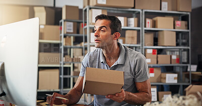 Buy stock photo Box, computer and logistics with man in distribution center for checklist, schedule or update. Information, reading and supply chain with employee in office for delivery, ecommerce or shipping