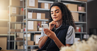 Buy stock photo Supply chain, distribution and woman with phone for delivery, logistics and inventory for ecommerce. Courier, warehouse and employee texting distributor for planning, shipping or supplier stock