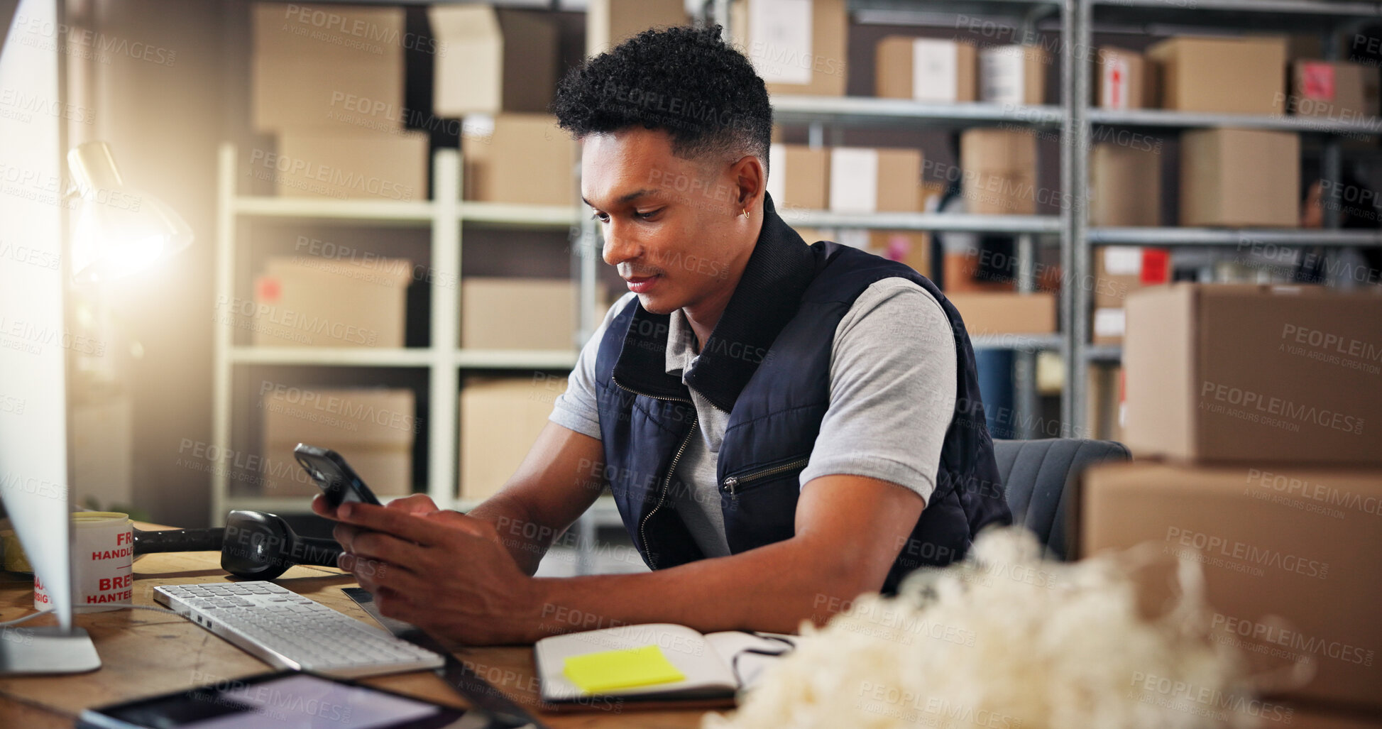 Buy stock photo Warehouse, shipping and man with phone in office for delivery, supply chain and retail production. Ecommerce, distribution and person on smartphone with boxes for manufacturing, logistics and contact