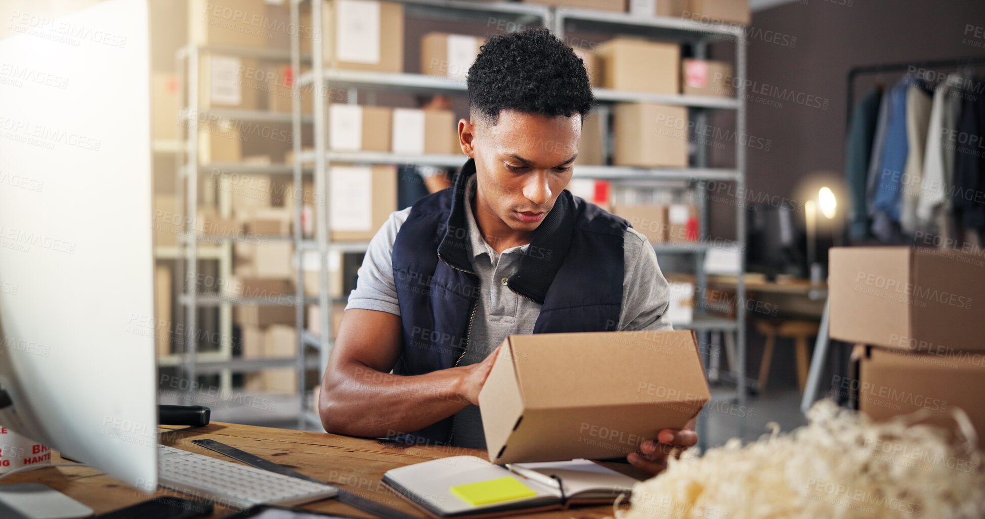 Buy stock photo Man, check and box in warehouse for distribution of inventory management, online order and stock. Person, computer and package for supply chain, quality assurance and label with shipping information
