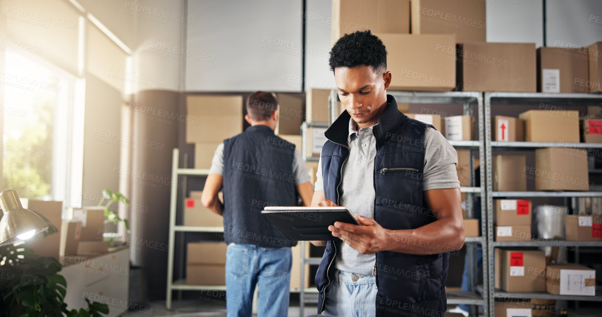 Buy stock photo Man, typing and tablet for distribution at warehouse of inventory management, online order and stock. Person, digital and boxes for supply chain, quality control and information for delivery schedule