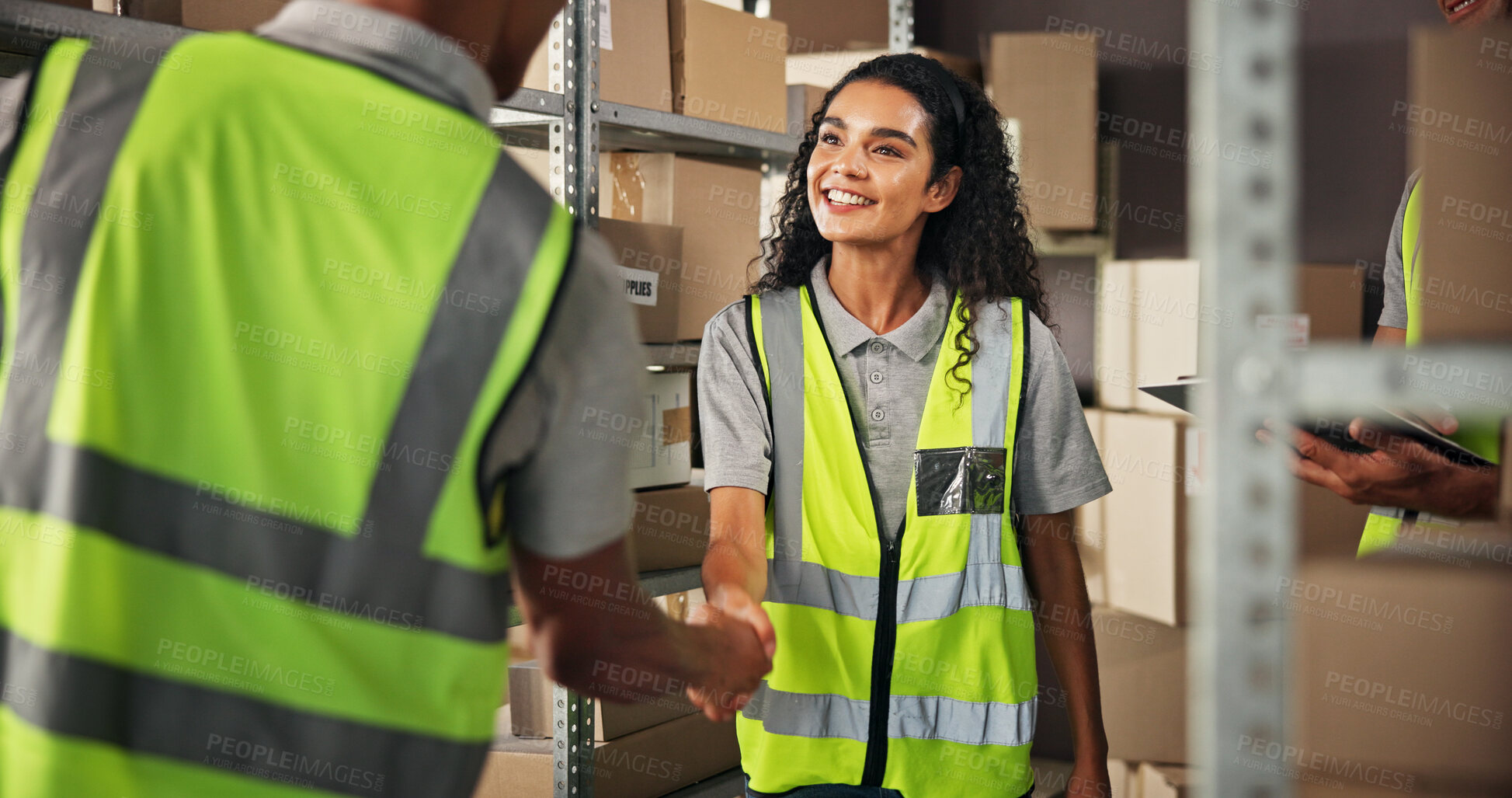 Buy stock photo Logistics, colleagues and people in warehouse, handshake and smile for agreement with supplier or stock. Happy, team and shaking hands for collaboration in factory, boxes and partnership for delivery
