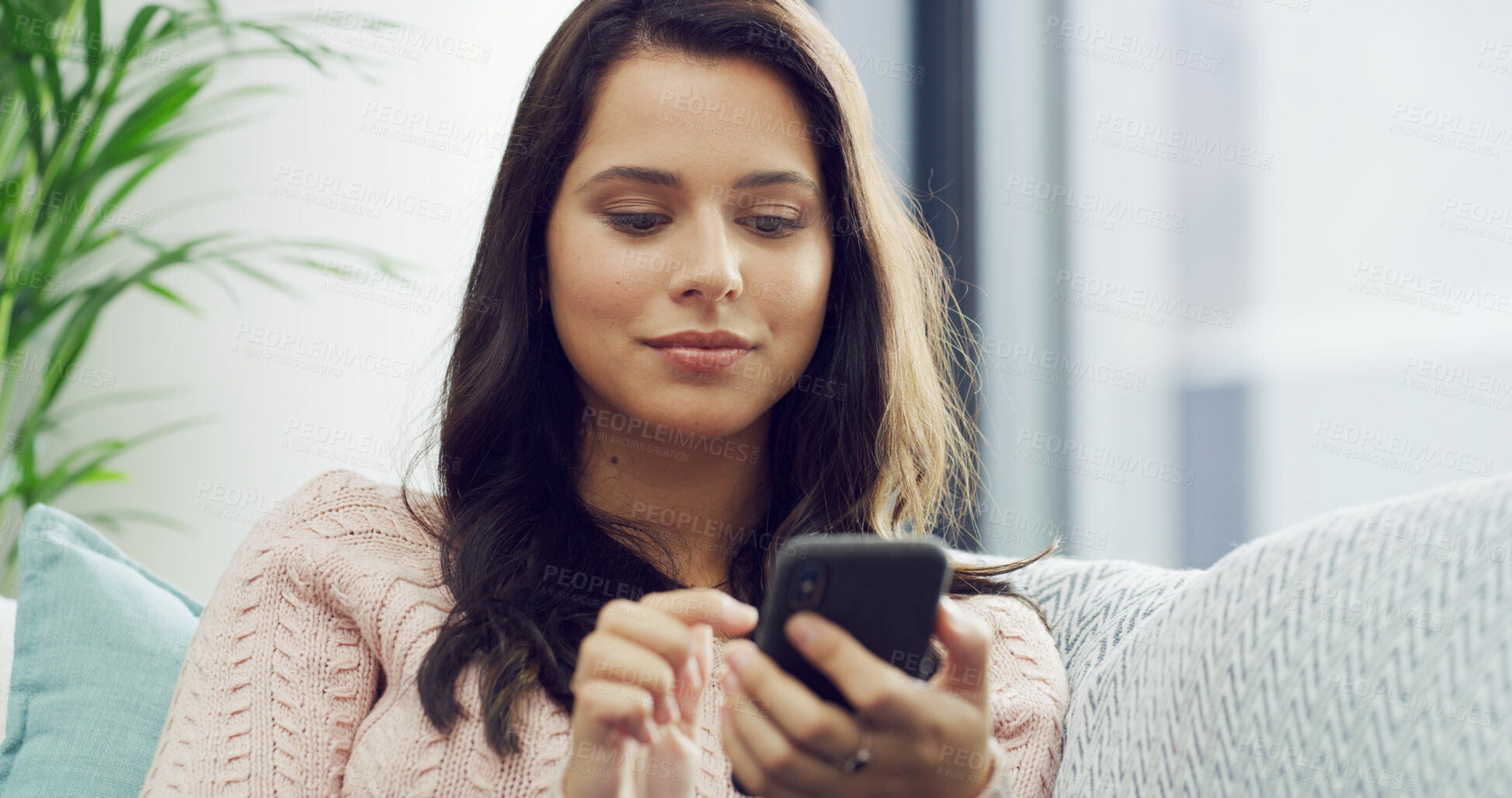 Buy stock photo Woman, scroll and relax with phone on sofa for social media browsing, streaming service or reading notification. Home, person and smartphone in lounge for text message, app download and communication