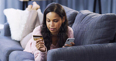 Buy stock photo Sofa, woman and phone with credit card for password, information and banking app for ecommerce. Home, female person and mobile with check for debit details, online shopping and relax on couch
