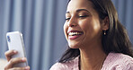 Home, woman and laugh with mobile for chat, online communication and comment for digital reel. House, female person and happiness with smartphone app for social media, meme and message with contact