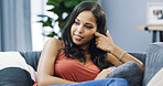 Home, relax and woman on couch, smile and weekend break with rest in living room. Funny, happy person and girl on sofa, cheerful and mindfulness with wellness, carefree and calm with morning