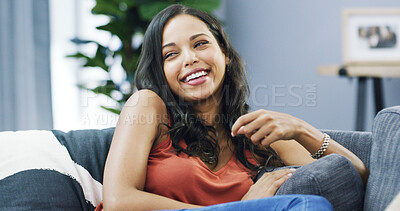 Buy stock photo Home, relax and woman on sofa, smile and weekend break with comfort in living room. Funny, happy person and girl on couch, cheerful and apartment with rest, cozy and wellness with morning and comfort