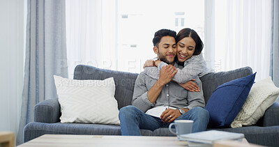 Buy stock photo Relax, love and hug with couple on sofa of home for bonding, support and care. Happiness, commitment and trust with man and woman in living room of apartment peace, smile and relationship romance