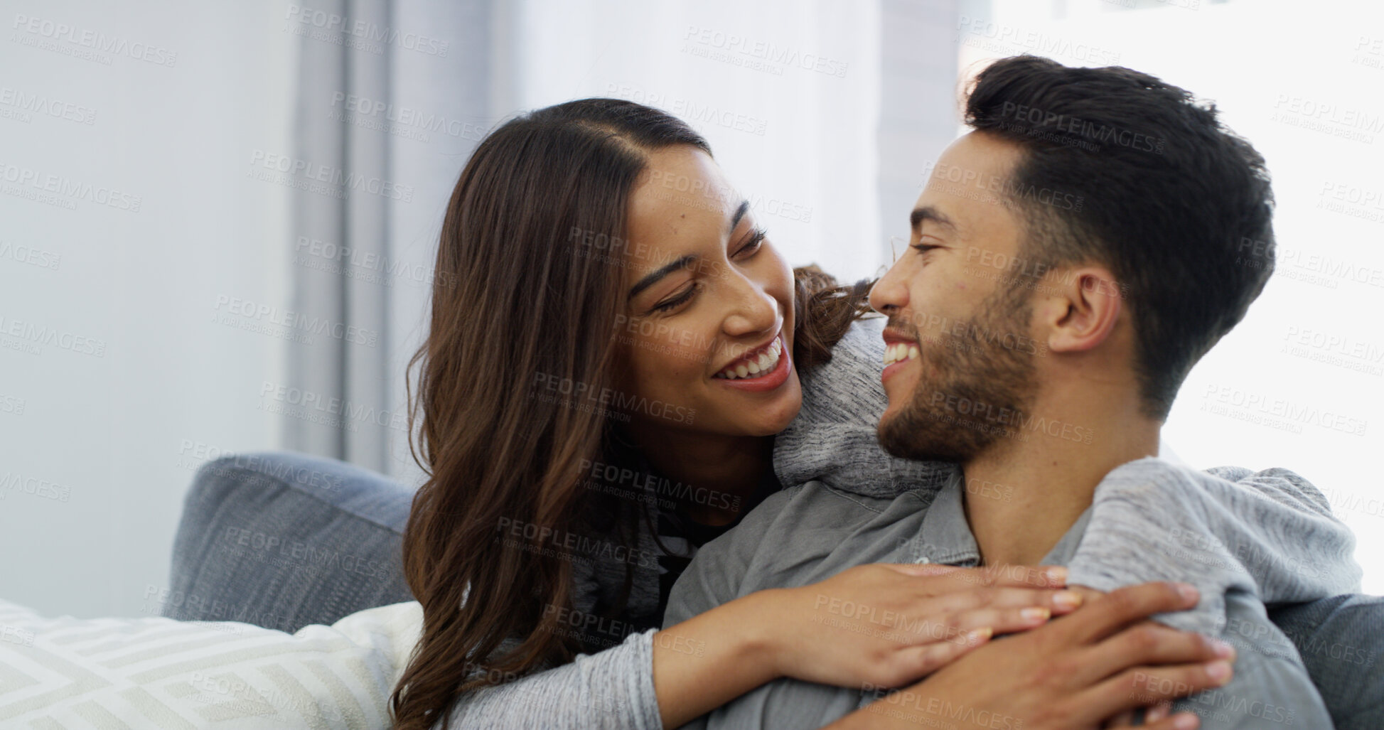 Buy stock photo Relax, love and bonding couple on sofa of home for date, support and care. Happiness, commitment and trust with man and woman in living room of apartment peace, smile and relationship romance