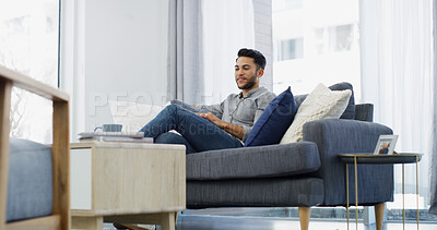 Buy stock photo Smile, man and relax with thinking on sofa for weekend break, nostalgia or happy memory. Peaceful person, thoughtful and daydreaming in living room with reflection, wondering and remember in house