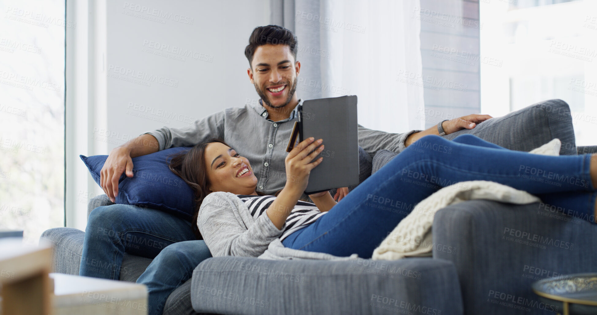 Buy stock photo Smile, couple and relax on tablet at house for browsing social media, online shopping and bonding. People, digital and website for ecommerce, banking app and partner decision for sign up subscription