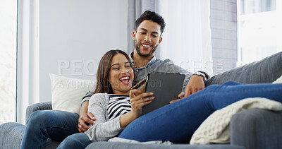 Buy stock photo Home, credit card and couple on couch, tablet and relax with ecommerce, transactions and payment. Apartment, man and woman with online banking, rent and technology with savings, mortgage and excited