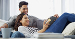 Online shopping, credit card and couple on sofa, tablet and relax with transactions, savings and payment. House, man and woman with fintech, banking or ecommerce with mortgage, investment or rent