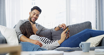 Buy stock photo Conversation, credit card and couple on couch, tablet and home with ecommerce, transactions and fintech. Banking, man and woman on sofa, online shopping and payment for mortgage, talking and savings