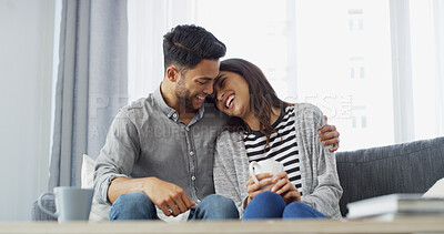 Buy stock photo Love, laughing or couple with coffee on sofa for conversation, bonding or relax together. Home, dating or man hug woman with drink for relationship, affection or embrace with happiness in living room
