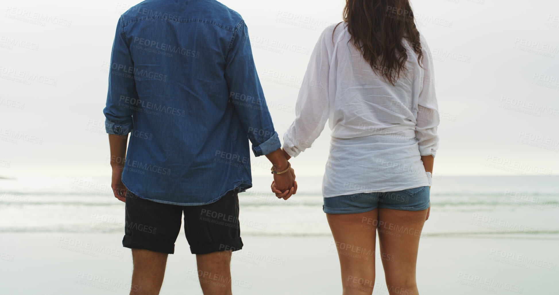 Buy stock photo Back, holding hands and love with couple on beach for date, summer vacation and support. Relax, adventure and travel holiday with man and woman outdoors for romantic trip, bonding and trust together