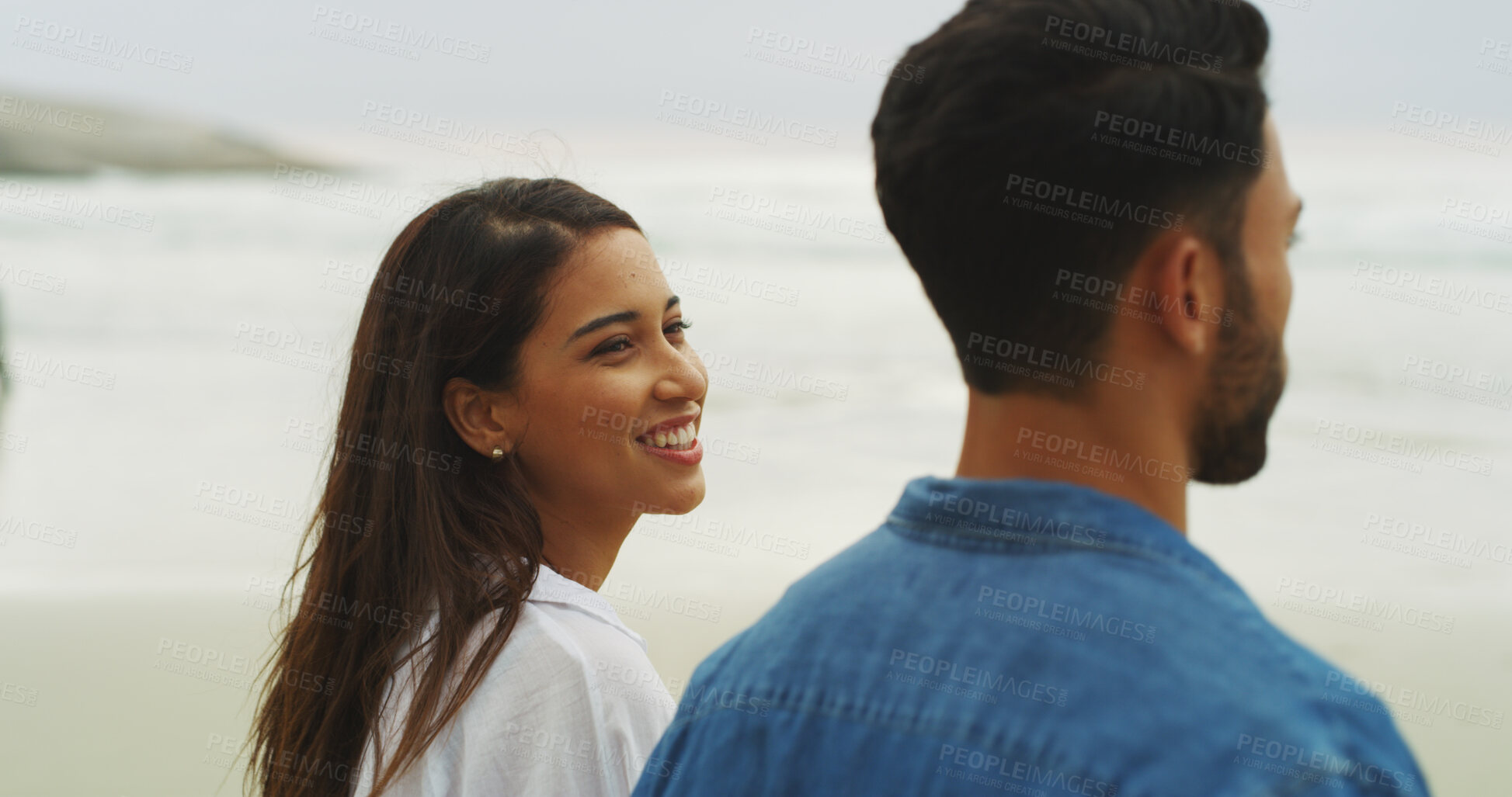 Buy stock photo Couple, beach and love on vacation with honeymoon, holiday or bonding outdoor in nature. Happy woman, man and relationship by sea for memory, romantic date and relax with security in commitment 
