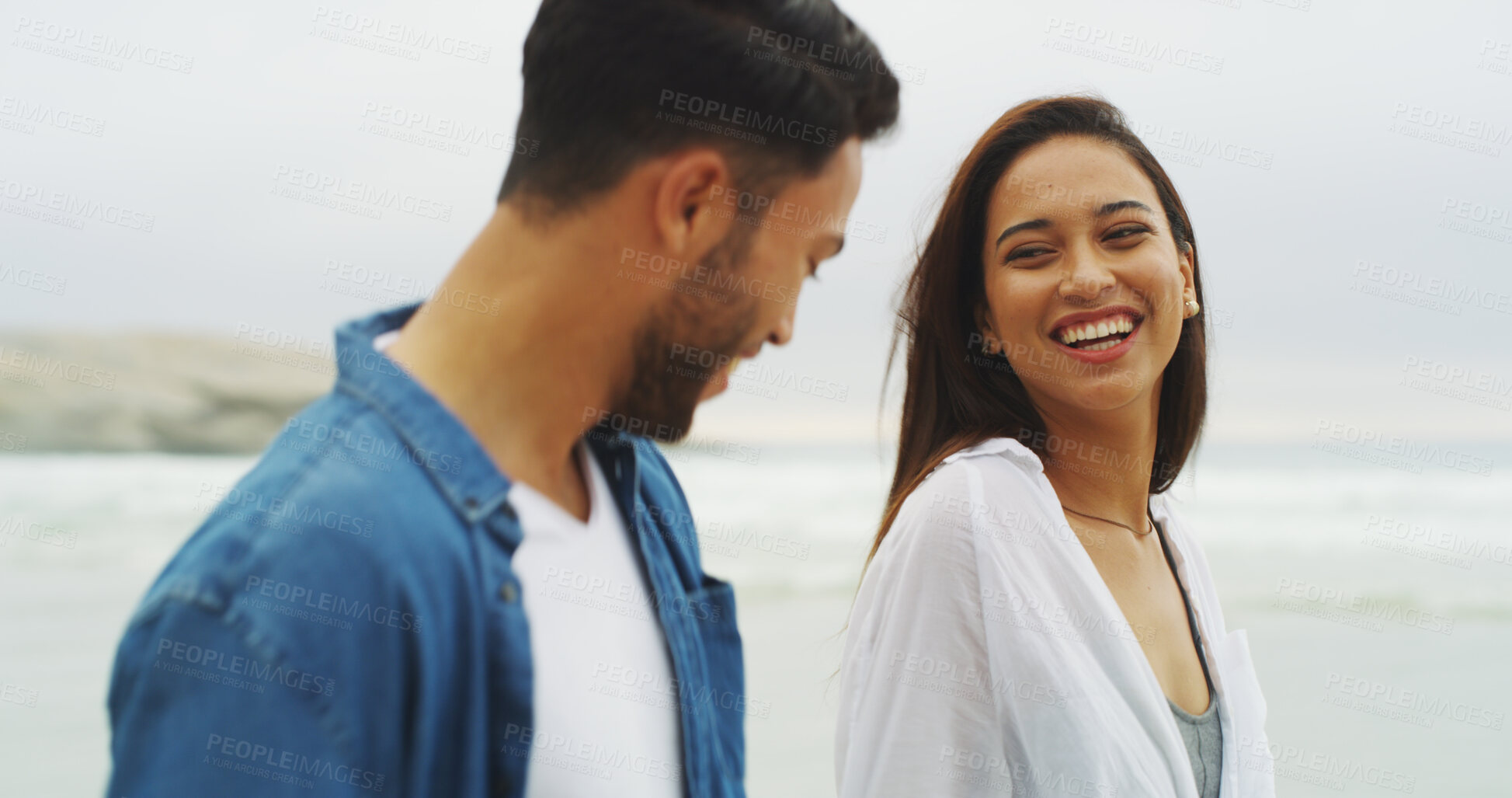 Buy stock photo Beach vacation, couple and laugh while walking on honeymoon, holiday or bonding outdoor. Woman, man and relationship by sea for memory, romantic date and love with funny conversation and care