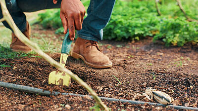 Buy stock photo Fork, gardening and hand of farmer on ground of countryside for digging in planting season. Agriculture, earth and nature with person outdoor on farm for agribusiness or sustainability closeup