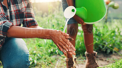 Buy stock photo Environment, washing hands and watering can with people on farm for cleaning, hydration or hygiene. Agriculture, bacteria and sustainability with farmers outdoor in green countryside for agribusiness