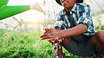 Hands, agriculture and washing with water can, person or child with splash for hygiene, germs or bacteria. Plastic container, cleaning and farming in greenhouse, dirt and agro in countryside
