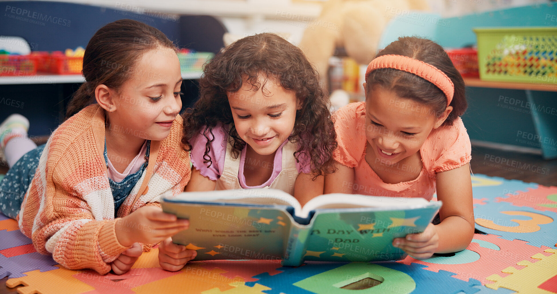 Buy stock photo Girls, reading and friends on carpet, school and learning with education, smile and bonding together. Group, storytelling and kids in classroom, literacy knowledge or happiness with child development