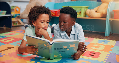 Buy stock photo Children, boy and reading book on floor in classroom, learning and together for education at academy. Kids, happy and friends on mat with literature, development and scholarship at elementary school