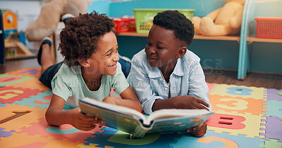 Buy stock photo Children, boy and book on floor in classroom, learning and together for education at academy. Kids, happy and friends on mat with literacy, development or reading for scholarship at elementary school