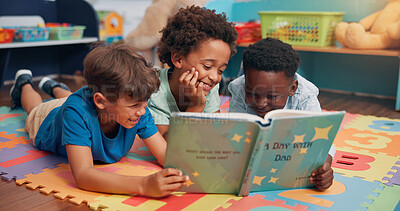 Buy stock photo Boys, reading and friends on carpet, school and learning with education, relax and bonding together. Group, storytelling and children in classroom, literacy knowledge and happiness with break