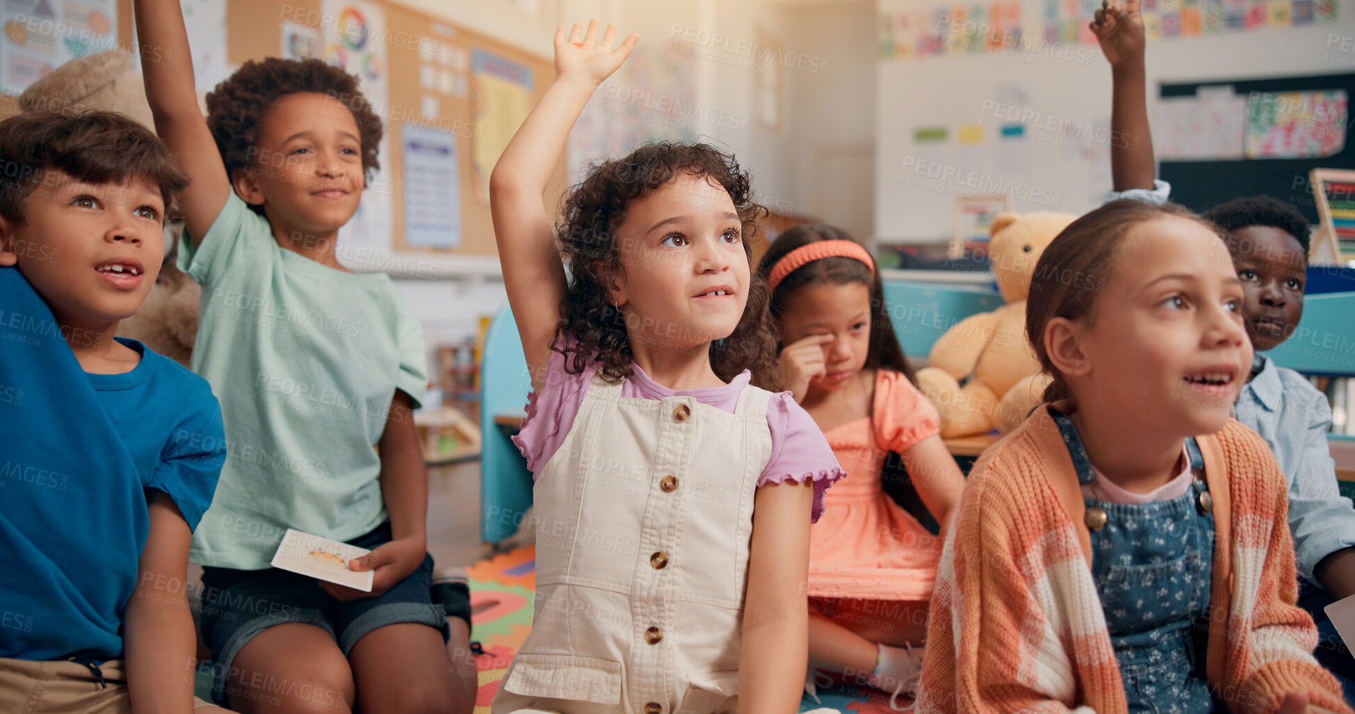 Buy stock photo Lesson, kids and hands raised with question in classroom for quiz questions, knowledge or study feedback. Floor, diversity people or students for learning development, solution or creative assessment