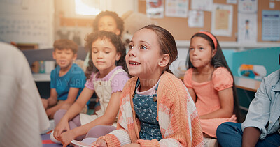 Buy stock photo School, class and children listening to teacher for reading lesson, education and learning. Teaching, students and kids on floor with educator for storytelling, language development and knowledge