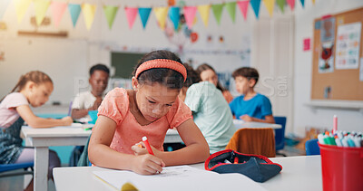 Buy stock photo Notebook, learning and writing with girl in classroom for child development, future and education. Academy, growth and scholarship with kid studying in school for knowledge, lesson and students