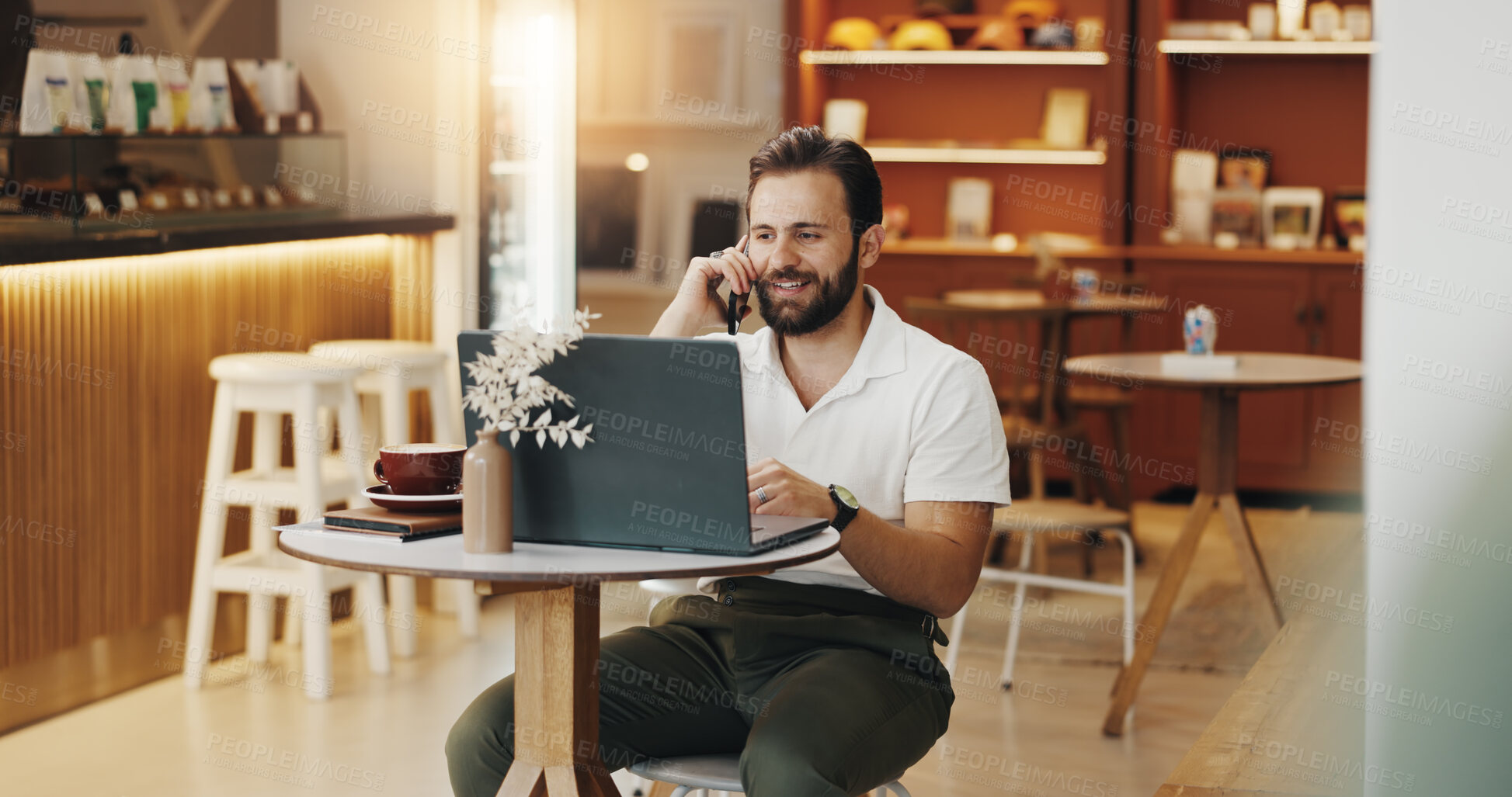 Buy stock photo Phone call, laptop and man in coffee shop for remote work, talking and journalist with story feedback. Cafe, happy freelancer and mobile for conversation, news or communication for publication online