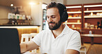 Music, laptop and man in coffee shop for remote work, research or copywriter with headphones for sound. Cafe, happy freelancer and listen to audio on computer for writing, article and online project
