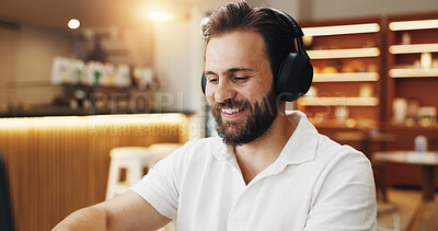 Buy stock photo Remote work, cafe and business man with headphones listening to podcast for online project, report and proposal. Coffee shop, freelancer and person on laptop for streaming music, website and research