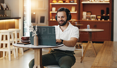Buy stock photo Headphones, laptop and happy man in cafe for remote work, music and copywriter research for blog. Coffee shop, freelancer and listen to audio on computer for writing, typing article or online project