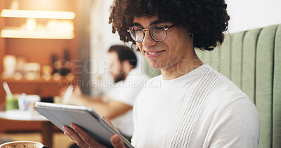 Buy stock photo Business, tablet and man in cafe, smile and digital app with confidence, copywriting and network. Person, creative and employee in coffee shop, connection or tech with research for article or relax