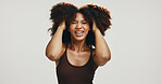 Smile, hair and portrait of woman in studio for volume, natural texture and beauty. Happiness, self care and cosmetics with African person on white background for growth, shampoo and salon treatment