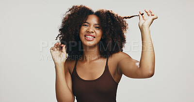 Buy stock photo Happy, afro or black woman for hair care, texture and glow for portrait, volume and natural shampoo. Studio, pull or model with beauty, smile and growth for cosmetics and results by white background