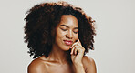 Smile, skincare and beauty with woman in studio for spa treatment, self care and cosmetics. Aesthetic, collagen and dermatology with African person on white background for shine, glow and salon