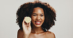 Lemon, portrait and African woman with skincare for beauty, confidence or treatment for glow or shine. Happy, studio and girl model with fruits for natural cosmetics or vitamin c by white background