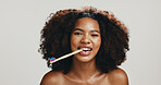Portrait, smile and woman with bamboo toothbrush, studio or sustainable product for dental care or toothpaste. Biodegradable, white background and oral hygiene for African person, grooming or morning