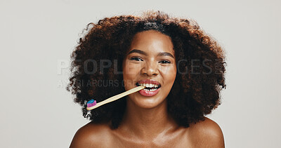 Buy stock photo Portrait, smile and woman with bamboo toothbrush, studio or sustainable product for dental care or toothpaste. Biodegradable, white background and oral hygiene for African person, grooming or morning