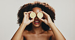 Lemon, skincare and woman with smile, studio and antioxidant benefits for smooth skin, cover and shine. White background, exfoliating and African person with cosmetics for glow, happy and model