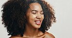 Beauty, skincare and face of African happy woman in studio for wellness, cosmetics and facial treatment. Dermatology, spa and person with smile for health, salon and natural skin on white background